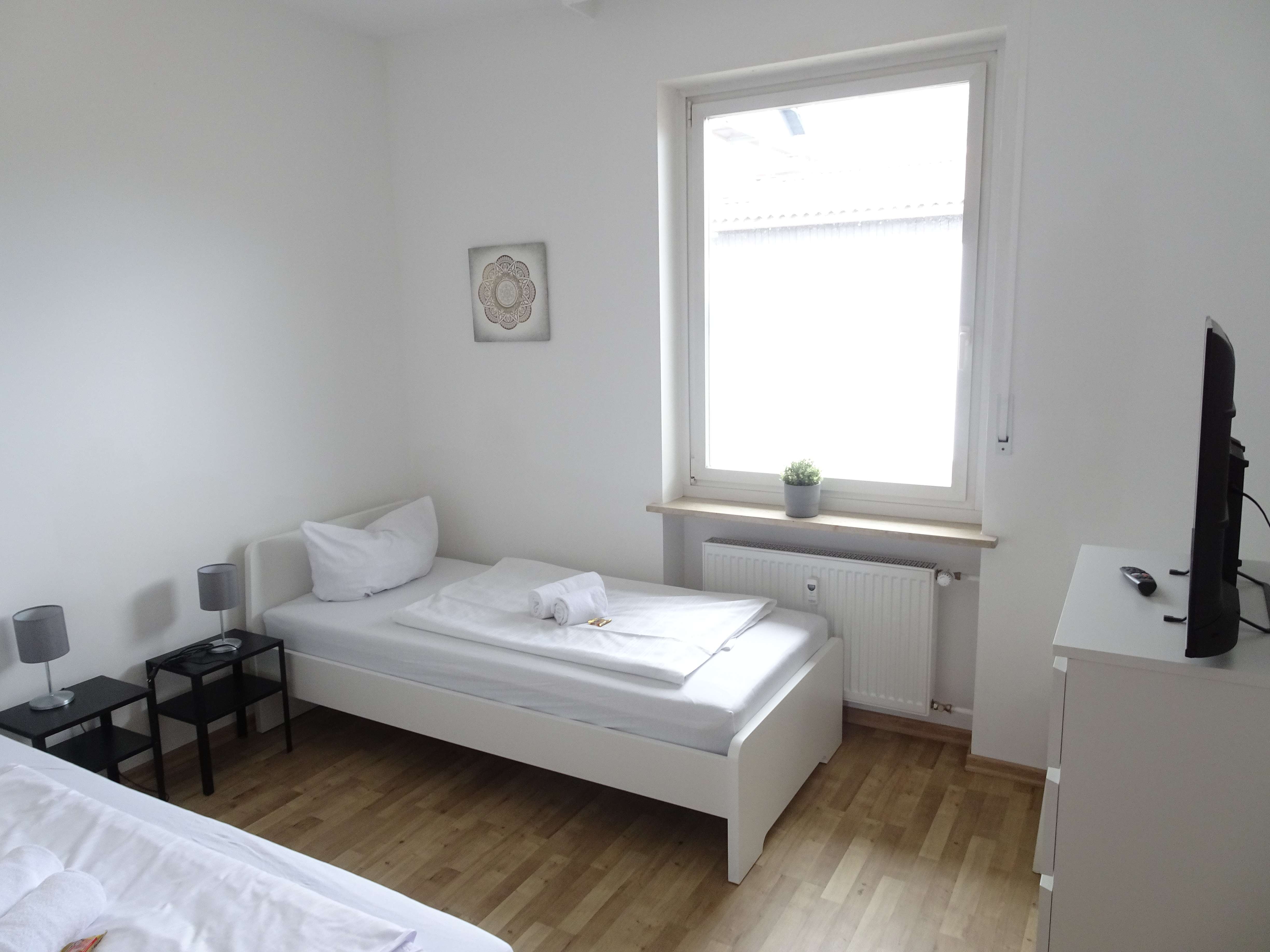 Immobilie in Herzogenaurach - Bungalow mit Wintergarten und Garage im Norden von Herzogenaurach - Bild 4