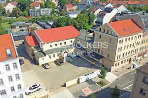 Wohn- und Geschäftshäuser mit Bauvoranfrage auf großem Grundstück  