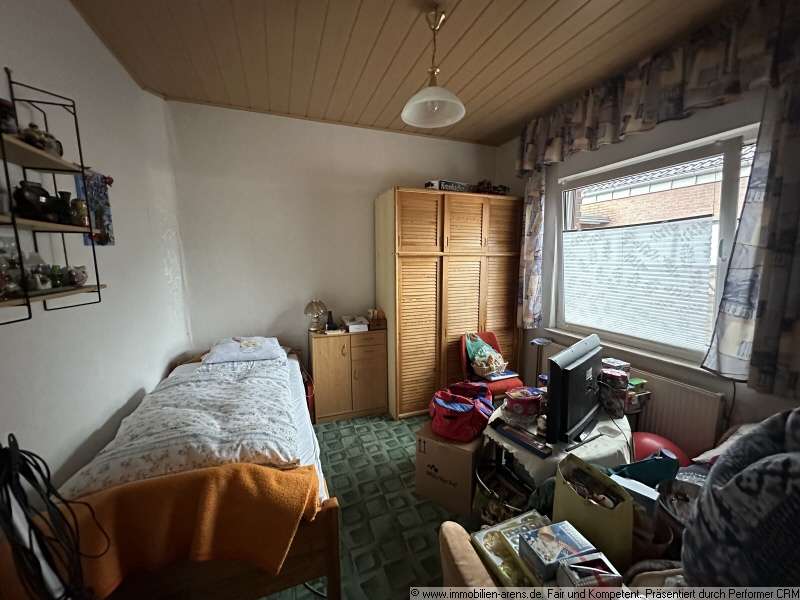 Immobilie in Apen - solides Klinkergebäude mit Garage und Wintergarten in Apen - Bild 7