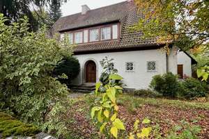 Grünwalder Rohdiamant * Charmantes Einfamilienhaus mit großem Potential zur individuellen Gestaltung – Dr.-Hans-Staub-Str. 10, 82031 Grünwald – Vorschaubild 1