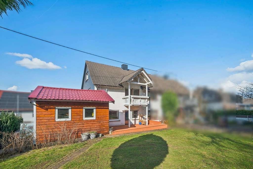 Immobilie in Hellenhahn-Schellenberg - Modernisierte DHH mit Garten als WEG geteilt - mit neuen Fenstern und einem neuem Kaminofen!! - Bild 2