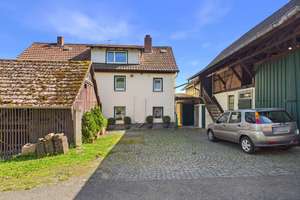 Flächenstarkes Einfamilienhaus mit Scheune, Garten & Ausbaupotenzial in Nidda-OT – Die vollständige Adresse der Immobilie erhältst du vom Anbieter., 63667 Nidda – Vorschaubild 2