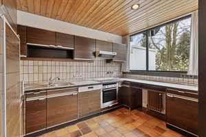 Einfamilienhaus in Split-Level-Bauweise als Raumwunder mit grüner Oase – Düsseldorf – Vorschaubild 18