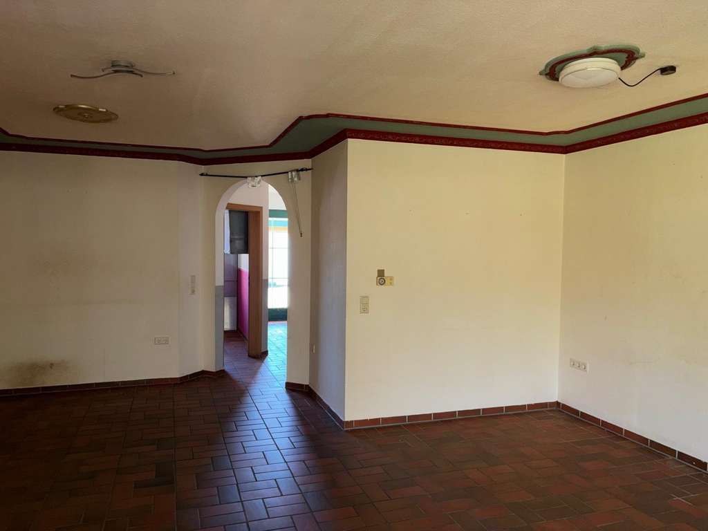 Immobilie in Sonsbeck - Reihenendhaus mit zusätzlichem Platzvorteil, Carport und kleiner Garage in Stadtrandlage von Sonsbe - Bild 4