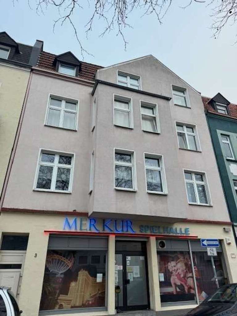 Gepflegtes Wohn- & Geschäftshaus am Krayer Markt
