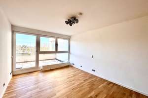 Charmante 1-Zimmer-Wohnung mit Balkon, Weitblick und TG-Stellplatz in beliebter Halbhöhenlage.