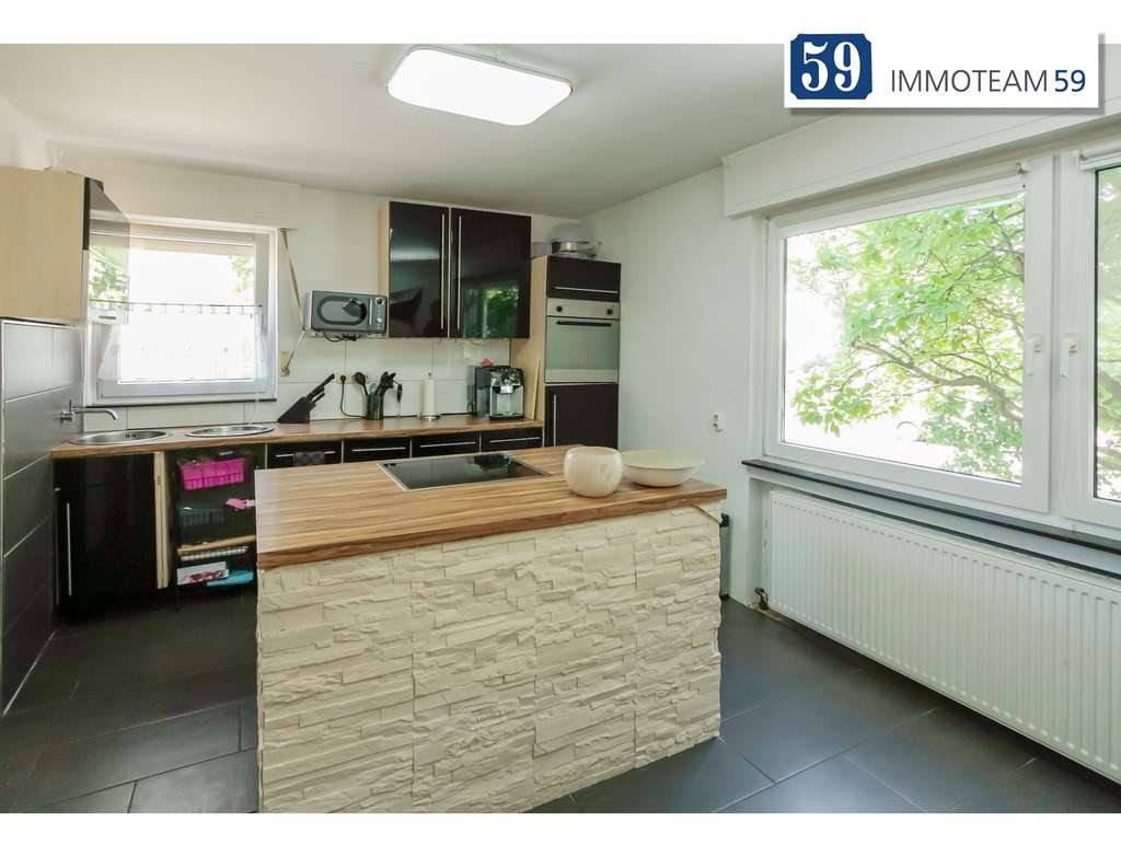 Immobilie in Rüsselsheim am Main - 3-Parteien Zinshaus -Rendite fast 4 % - Bild 0