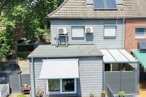 Perfekt für die kleine Familie! Liebevoll saniertes Reihenendhaus mit tollem Garten!