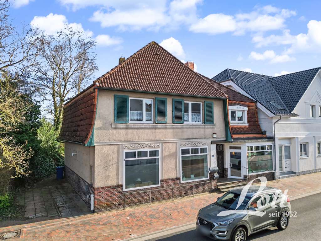 Immobilie in Apen - +++ Historisches Wohn- und Geschäftshaus in frequentierter Ortskernlage in Apen +++ - Bild 0