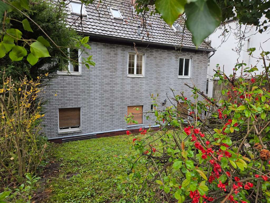 Immobilie in Menden - Verborgener Schatz in Zentrumsnähe – mit Garten & Garage - Bild 1