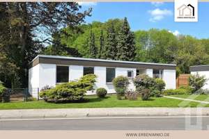 Bungalow mit unverbaubarem Grünblick & großem Grundstück