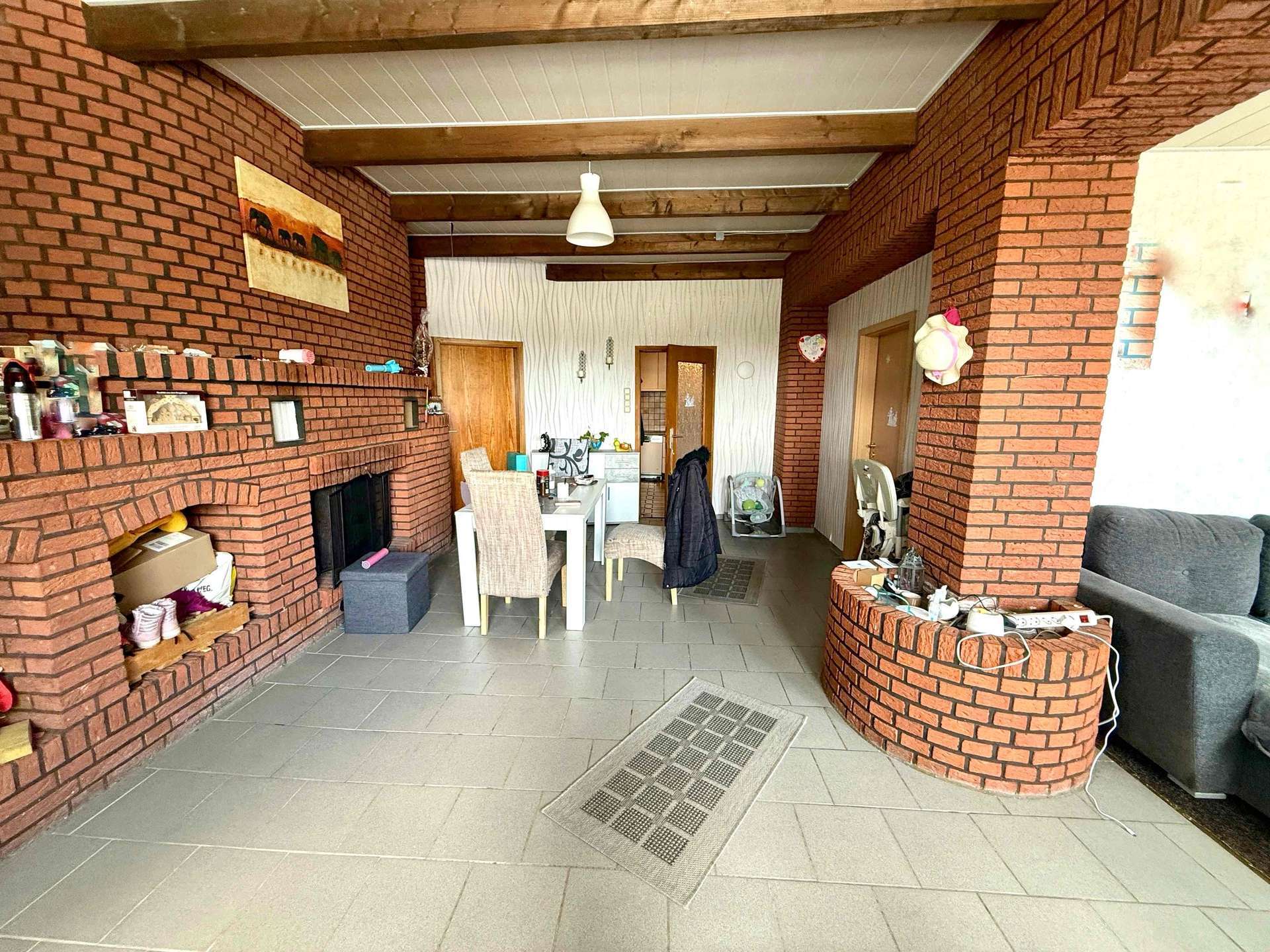 Immobilie in Südbrookmerland - Vielseitiges Wohn- und Geschäftshaus mit 3 Einheiten, kernsanierter Fleischerei & PV-Anlage - Bild 5