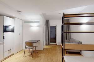Modernes 1-Zimmer-Apartment mit kleiner Terrasse und Einbauküche