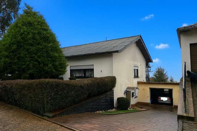 Wohnen mit Charme: 3-Zimmer-Wohnung mit Einzelöfen in Nonnweiler, Sankt Wendel Kreis – Bild 1