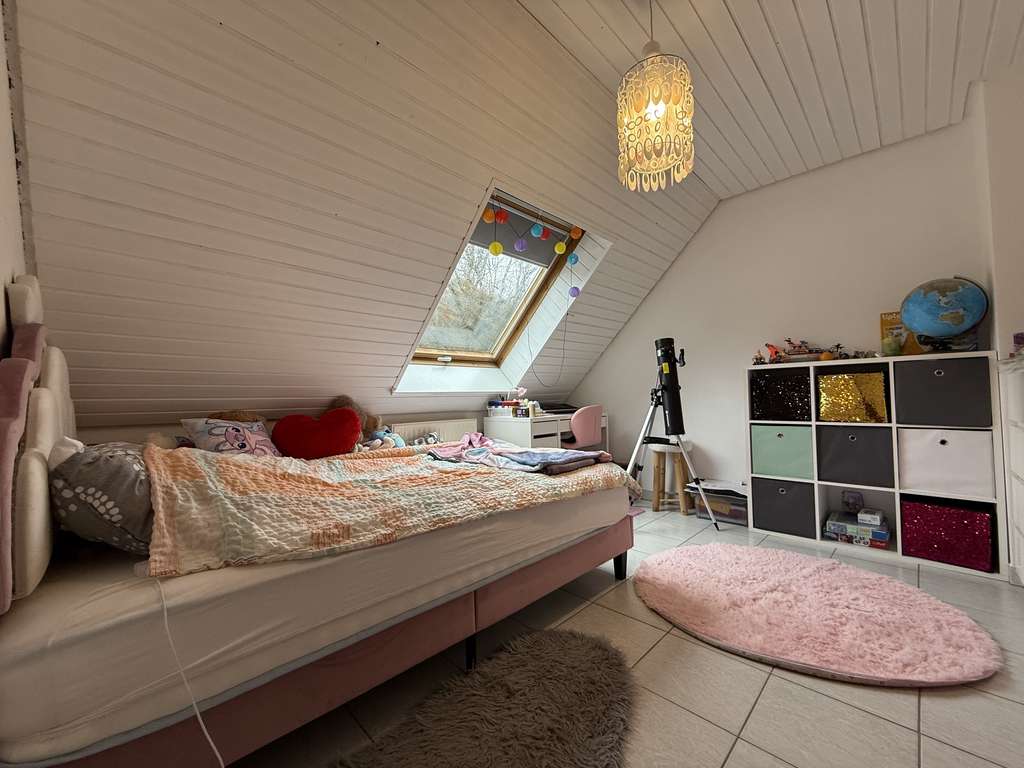 Immobilie in Haiterbach - Exklusive Maisonette-Wohnung mit Balkon und Carport - perfekt vermietet - Bild 1