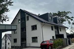 Exklusive Wohnung in Neubauqualität mit Terrasse & eigenem Garten