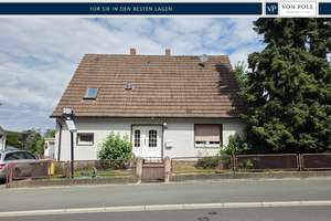 Einfamilienhaus mit Potential und sensationellem Fernblick