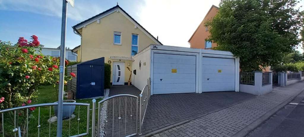 Immobilie in Oestrich-Winkel - Wunderschönes Einfamilienhaus mit Garagen und Garten - Bild 2