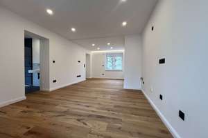Lichtdurchflutete 2-Zimmer-Wohnung mit luxuriöser Ausstattung und privater Terrasse