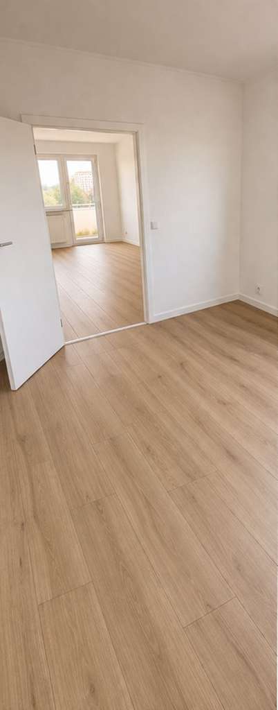 Immobilie in Waren (Müritz) - Perfekt für Eigennutzer oder Kapitalanleger - 3-Zimmer-Wohnung mit Seeblick - Bild 1