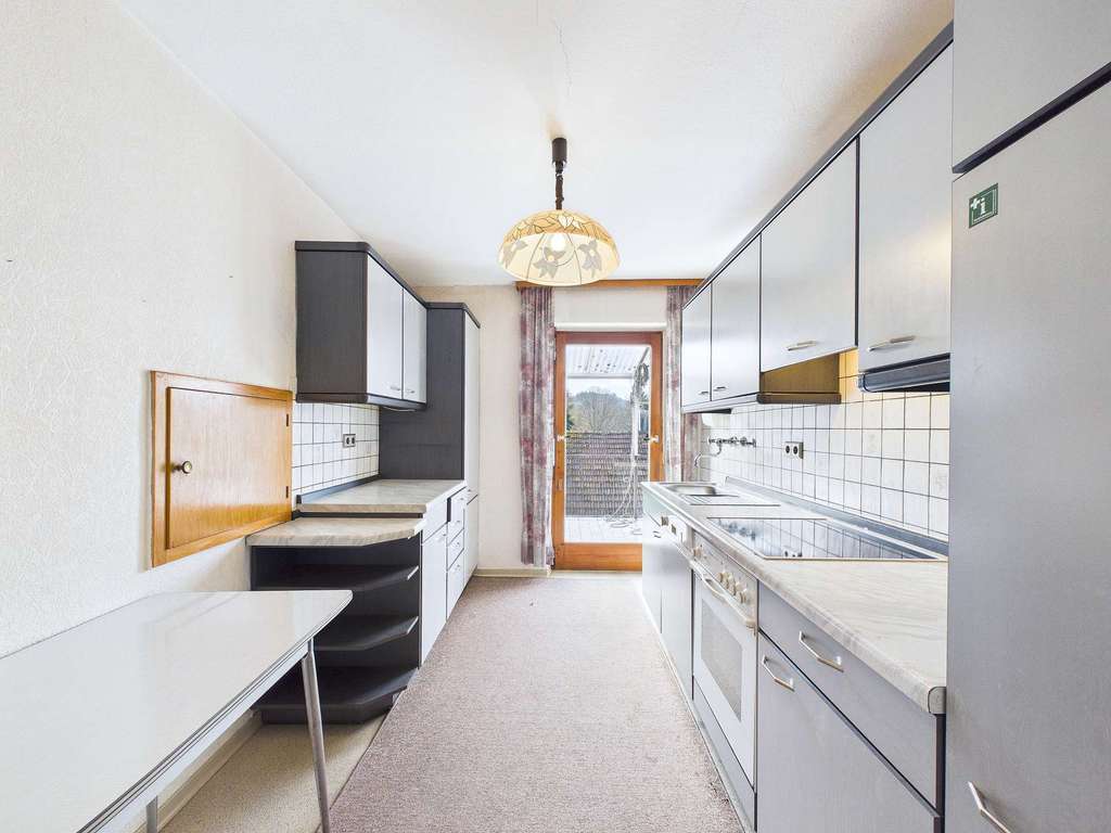 Immobilie in Kirkel - Wohn- und Geschäftshaus mit Carport und Garten - Bild 2