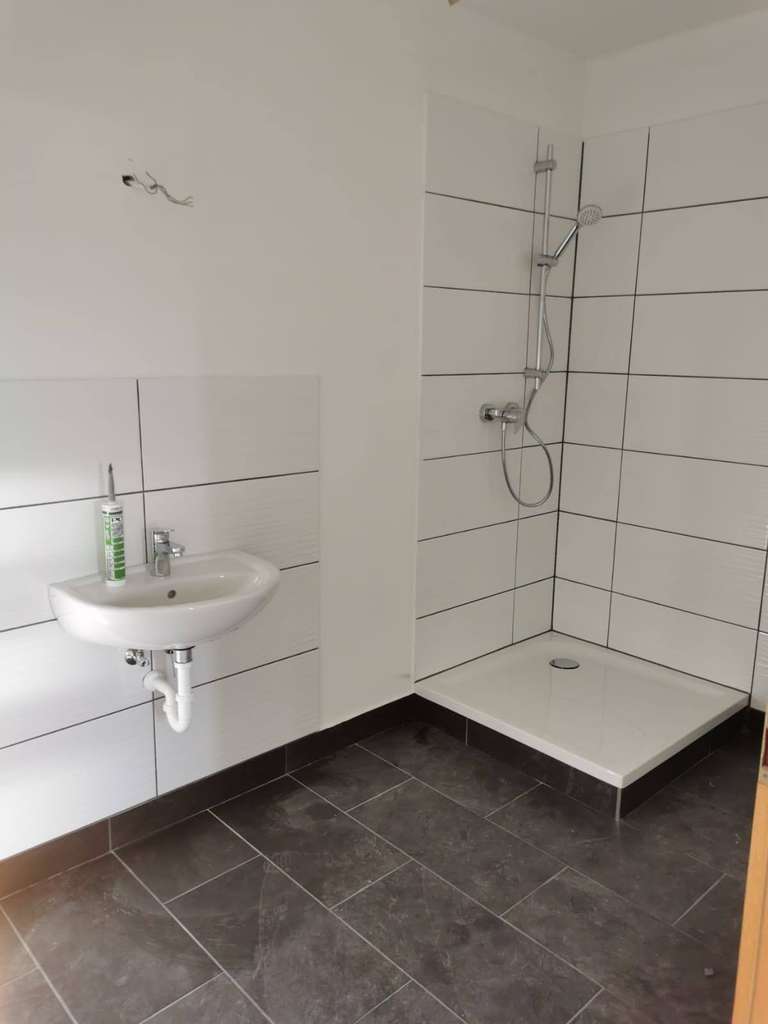 Immobilie in Crimmitschau - Sicher vermietet & modernisiert: Mehrfamilienhaus in Crimmitschau mit Ausbaureserve im Dachgeschoss - Bild 4