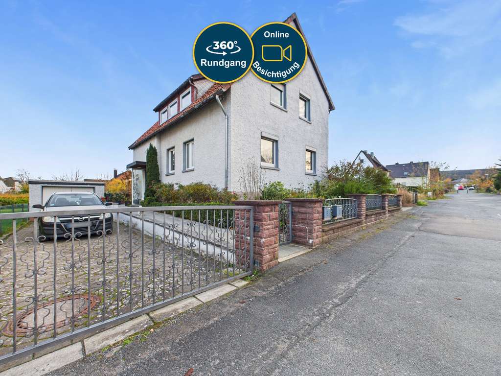 Immobilie in Barsinghausen - Zweifamilienhaus mit Einliegerwohnung, großem Garten, 2 Garagen & 2 Stellplätzen - Bild 0