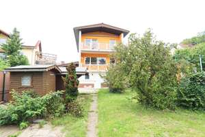 Wohnvielfalt in Meckesheim: Dreifamilienhaus mit Anbau, Garten und Garagen – Die vollständige Adresse der Immobilie erhältst du vom Anbieter., 74909 Meckesheim – Vorschaubild 1