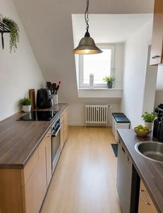 Gepflegte 2 Zimmer Wohnung im Dachgeschoss 58m2
