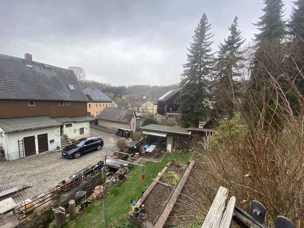 Immobilie in Grünhainichen - Einfamilienhaus mit Doppelgarage und schönem Garten - Bild 3