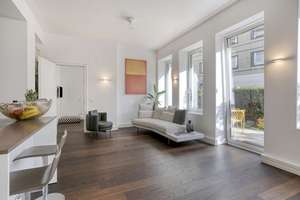 City-Luxus im Gerling Quartier – EG-Wohnung, 3 Zimmer  mit Terrasse & kleinem Garten