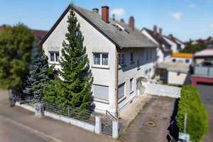 Vermietetes Dreiparteienhaus in Neu-Ulm/Offenhausen – Attraktive Kapitalanlage mit Mieteinnahmen