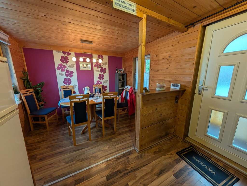 Immobilie in Vollersode - Großzügiges Grundstück im Grünen – charmantes Haus mit viel Platz für Mensch & Tier - Bild 3