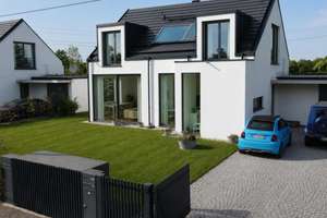 Exklusives Einfamilienhaus mit Designanspruch, großzügigem Garten und hochwertiger Ausstattung
