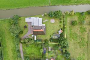 Historisches Reetdachhaus mit parkähnlichem Garten und direkter Wasserlage – Die vollständige Adresse der Immobilie erhältst du vom Anbieter., 26939 Ovelgönne – Vorschaubild 4