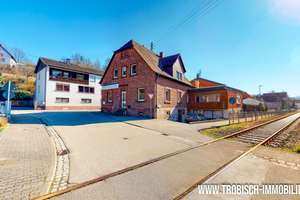 Großes Mehrfamilienhaus mit 2 Wohnungen, 2 Gewerbeeinheiten und Entwicklungspotenzial – Hauptstraße 2, 76891 Bruchweiler-Bärenbach – Vorschaubild 9