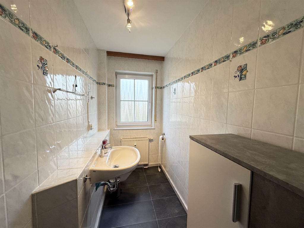 Immobilie in Dorsheim - Attraktives freistehendes Einfamilienhaus mit großem Garten und Einliegerwohnung - Bild 4