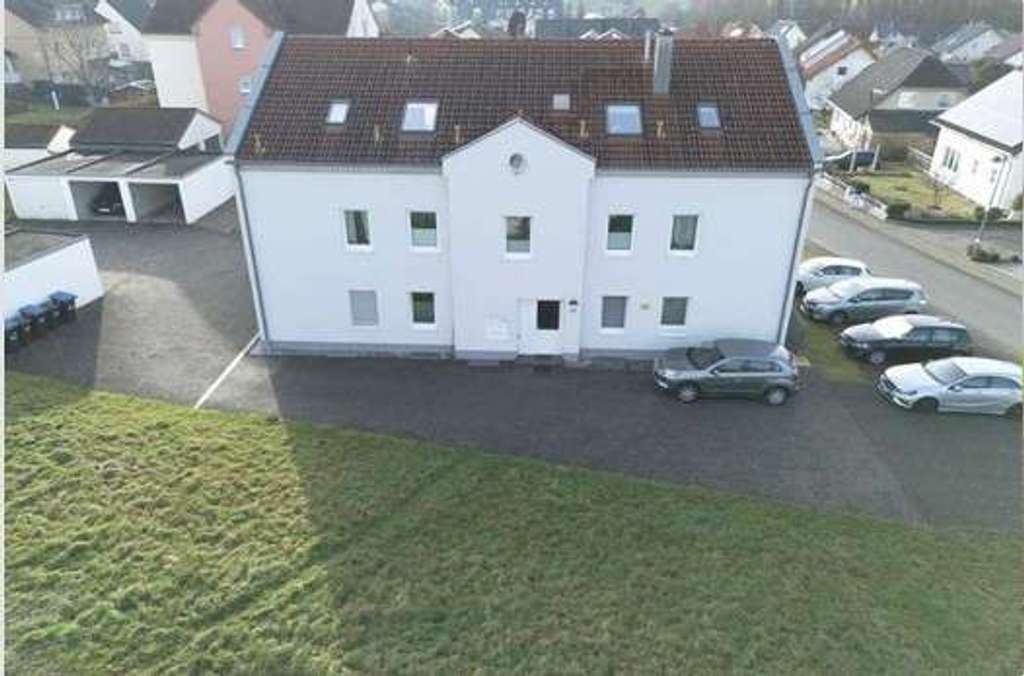 Immobilie in Gerolstein - Renditeobjekt mit 6 Wohneinheiten und 6 Garagen in guter Lage in Gerolstein zu verkaufen! - Bild 2