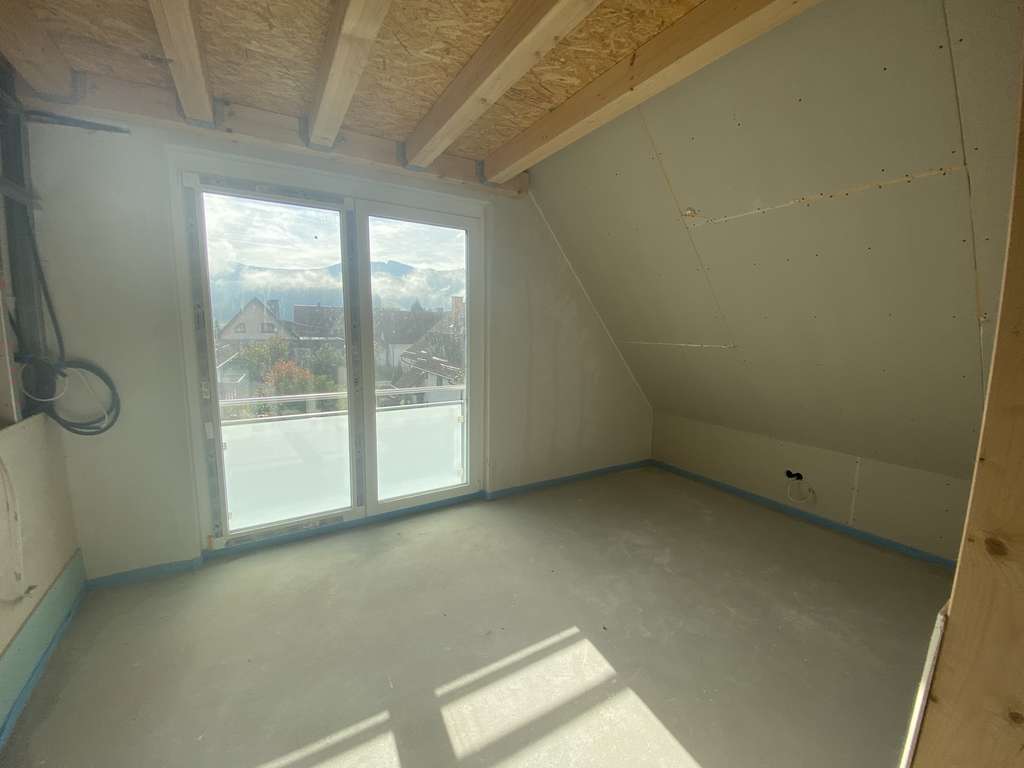 Immobilie in Wittnau - Neubauwohnen mit Loft-Charakter - DG Wohnung mit hohen Decken - Bild 2