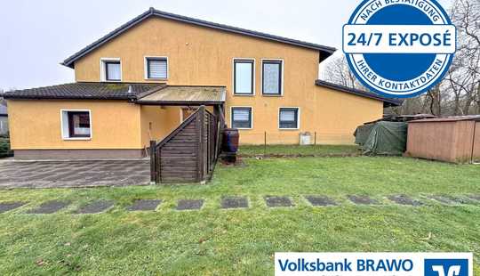 Bild von Ein Haus voller Möglichkeiten - mit Garten und Garage