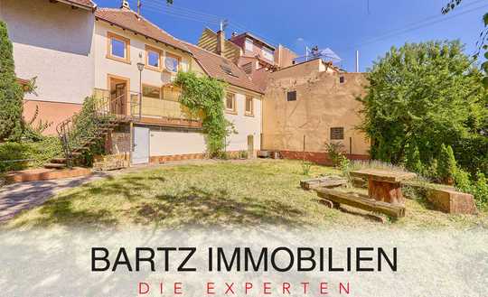 Teilsaniertes Zweifamilienhaus auf der Haardt mit großem Gartengrundstück in sonniger Lage