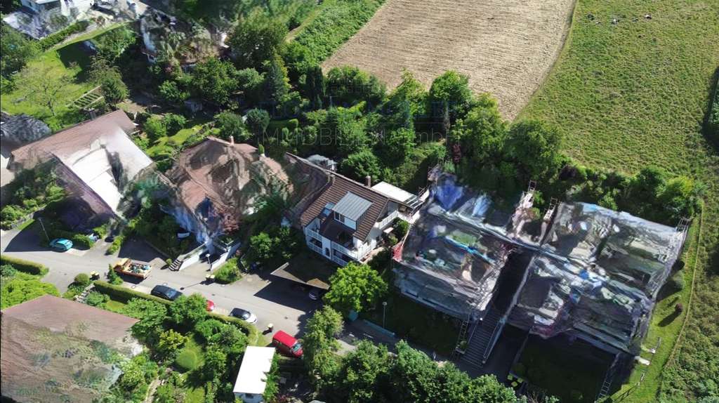 Immobilie in Merzhausen - Top Aussicht über Merzhausen- DHH mit 2-Zimmer-ELW – Raum & Extra-Grundstück für die ganze Familie - Bild 3