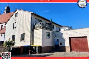 Freistehendes 3-Familienhaus mit Nebengebäude und Garage