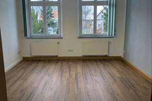 Modernisiertes Mehrfamilienhaus mit attraktiver Gewerbeeinheit – Ihre Investitionschance!