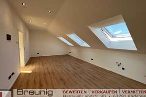 Hochwertige 2-Zi.-Dachgeschosswohnung mit Seeblick in ruhiger Lage