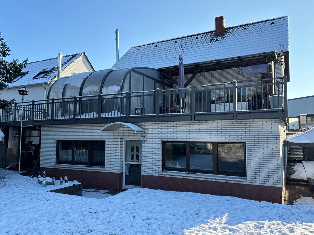 Immobilie in Mannheim - Gepflegtes Einfamilienhaus mit 6 Zimmern, großem Garten und Garage – Erbbaurecht bis 2056 - Bild 2