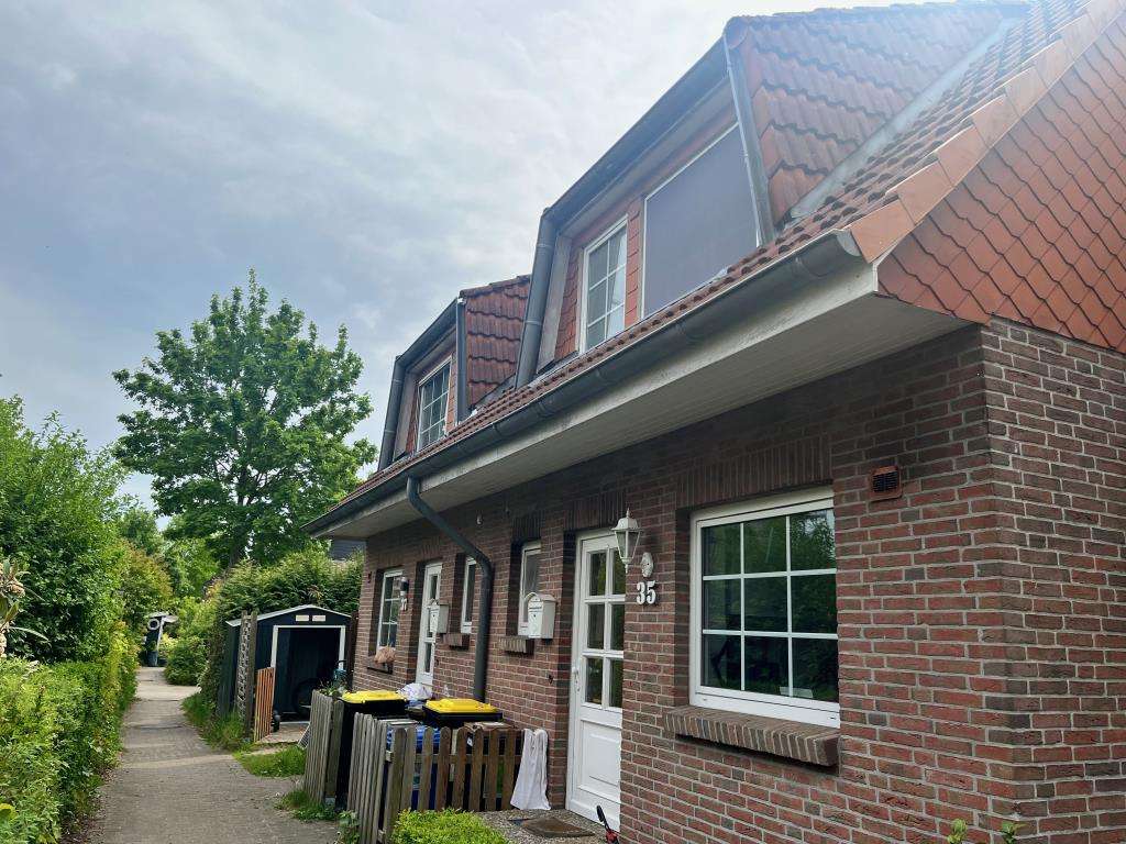 Immobilie in Tornesch - *** SCHÖNES REIHENMITTELHAUS ALS KAPITALANLAGE *** - Bild 0