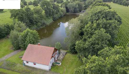 Bild von Wohnen mit eigenem See – ein privates Refugium