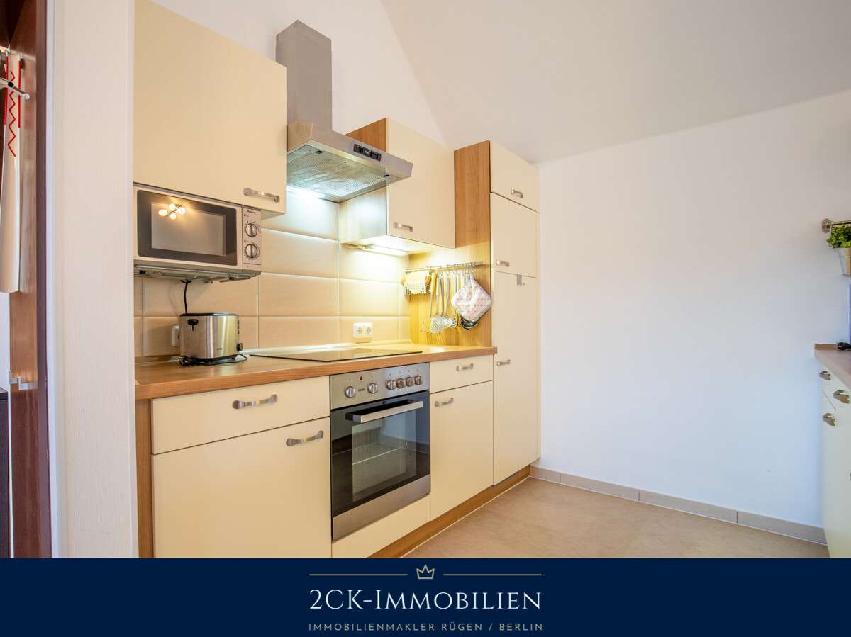 Immobilie in Glowe - 2 Zimmer Premium Ferienwohnung in Glowe, strandnah, zwei Balkone, Sauna, Kamin, inkl. Stellplatz! - Bild 14