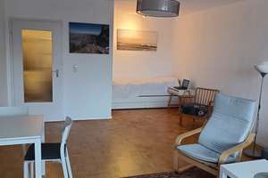 Helle City-Oase mit Weitblick: 1-Zimmer-Wohnung mit Balkon & Tiefgaragen-Stellplatz im Westlichen Ri